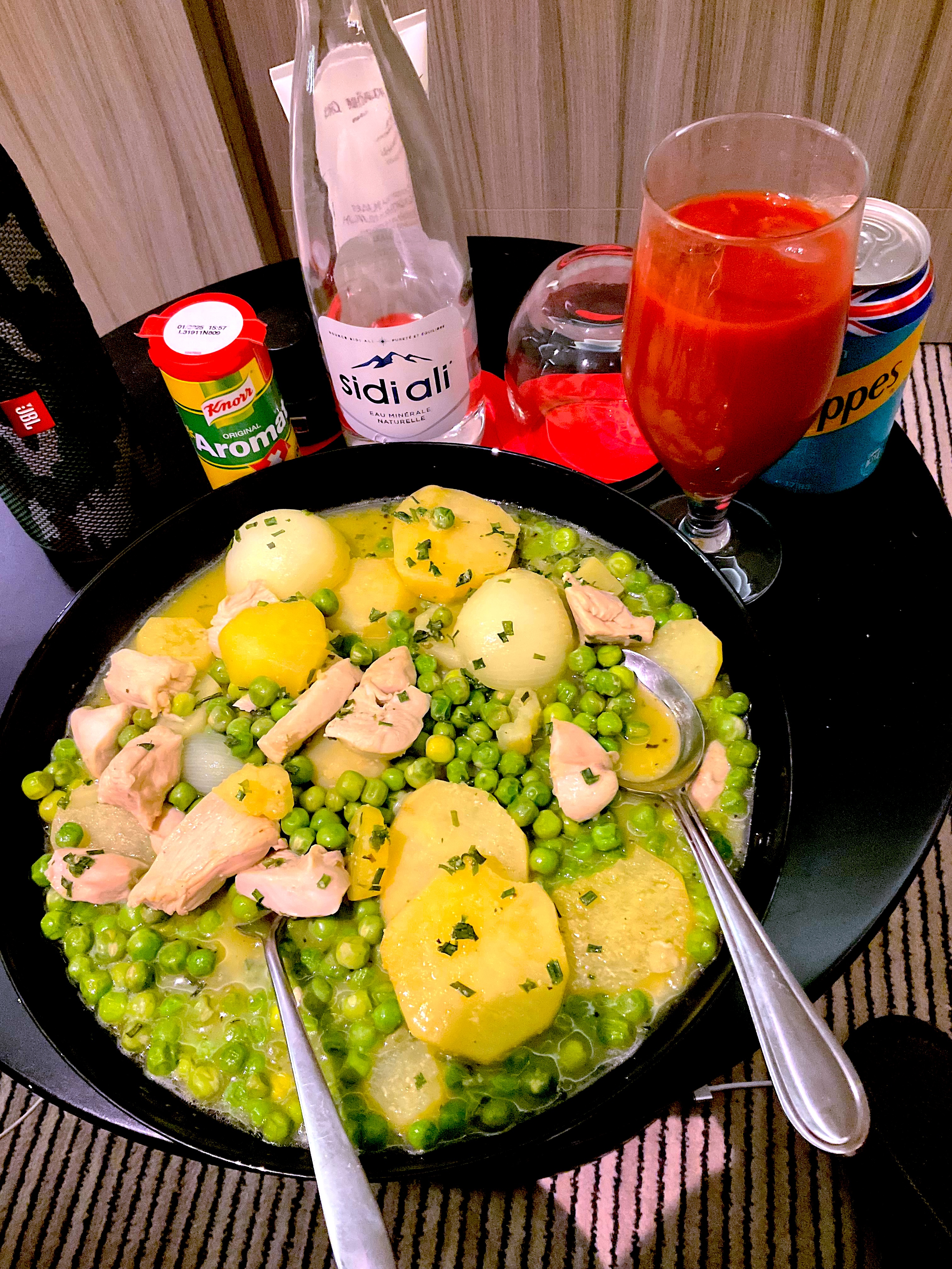 A chicken with peas