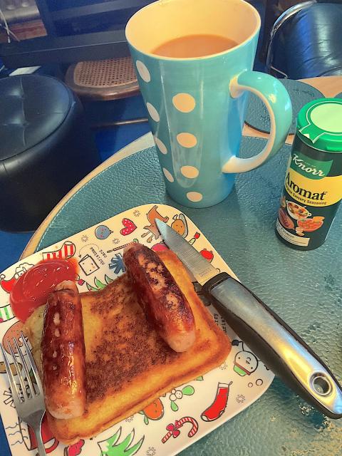 A Sausage and fried bread brekkie