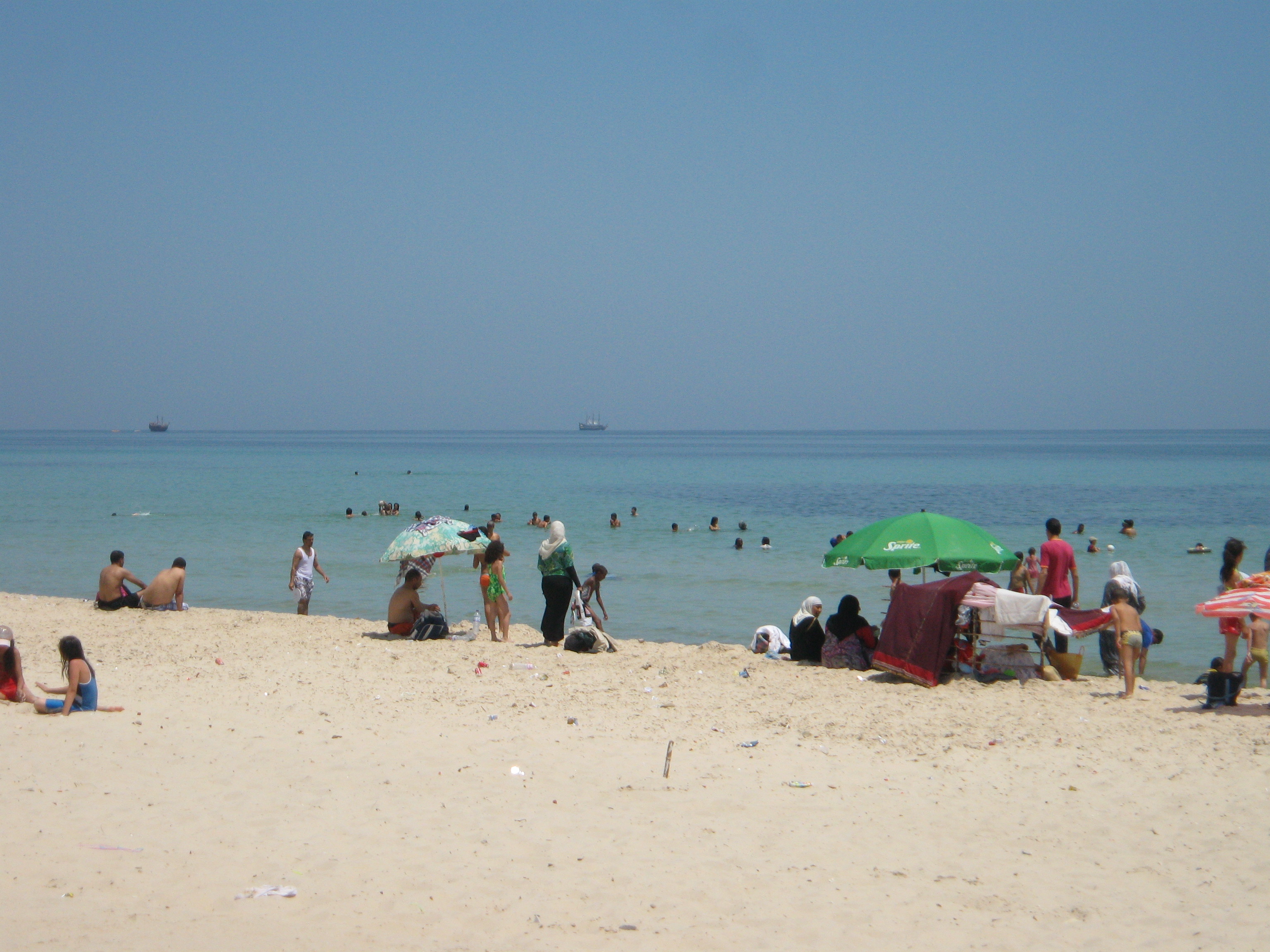 Happy Tunisian family at the beach