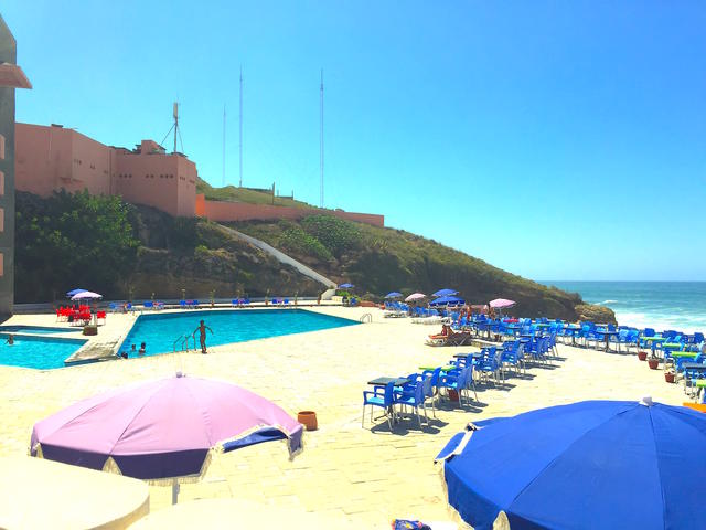 A Pool, A Beach, Paradise